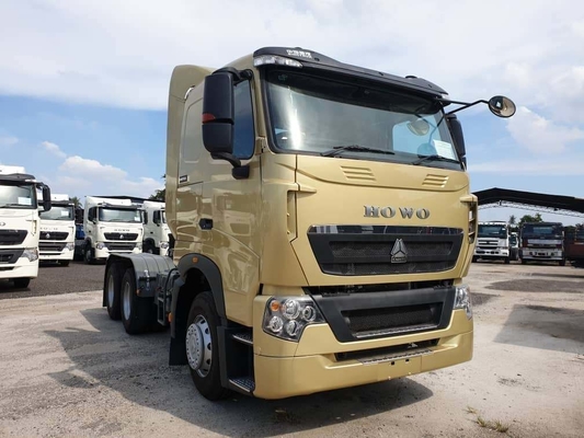 Camión de descarga con capacidad de carga de 21-30 t y camión tractor usado
